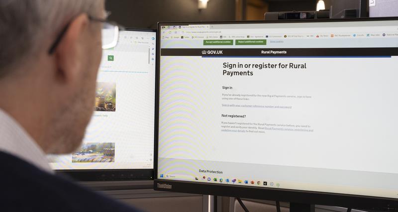 A man looking at the rural payments service on gov.uk