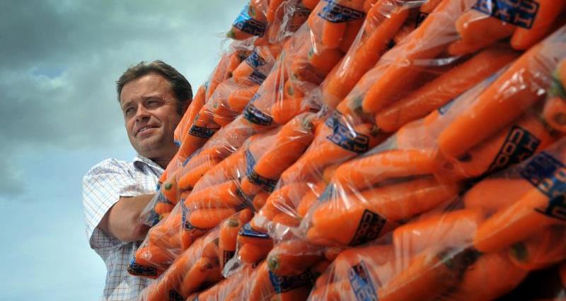 Guy Poskitt with a pile of packed carrots