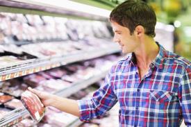 Man reading meat labelling_19962