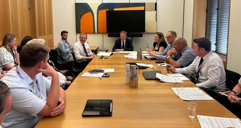 MPs around the table deep in discussion.