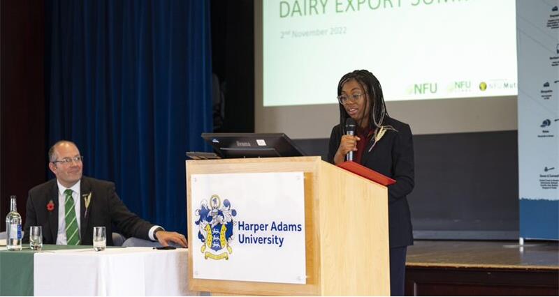 A picture of Trade Secretary, Kemi Badenoch MP speaking at the NFU dairy summit. Tom Bradshaw is also pictured. 