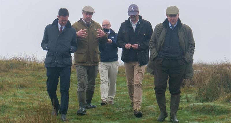 NFU members walking across Dartmoor with the Farming Minister, in conversation about the value of the uplands
