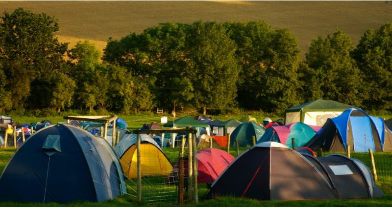 An image of tents on a farm