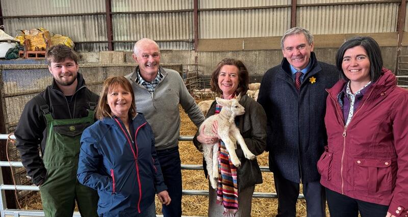 Pictured (L-R) the host family of Daniel, Eryl and Dai Charles Evans; First Minister of Wales, Eluned Morgan MS; NFU Cymru President, Aled Jones; and NFU Cymru Deputy President,  Abi Reader 