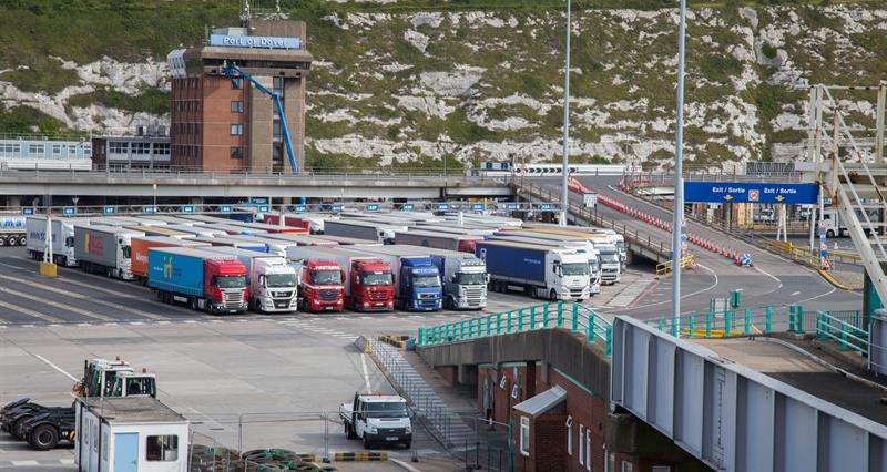 A photo of haulage lorries waiting at a port