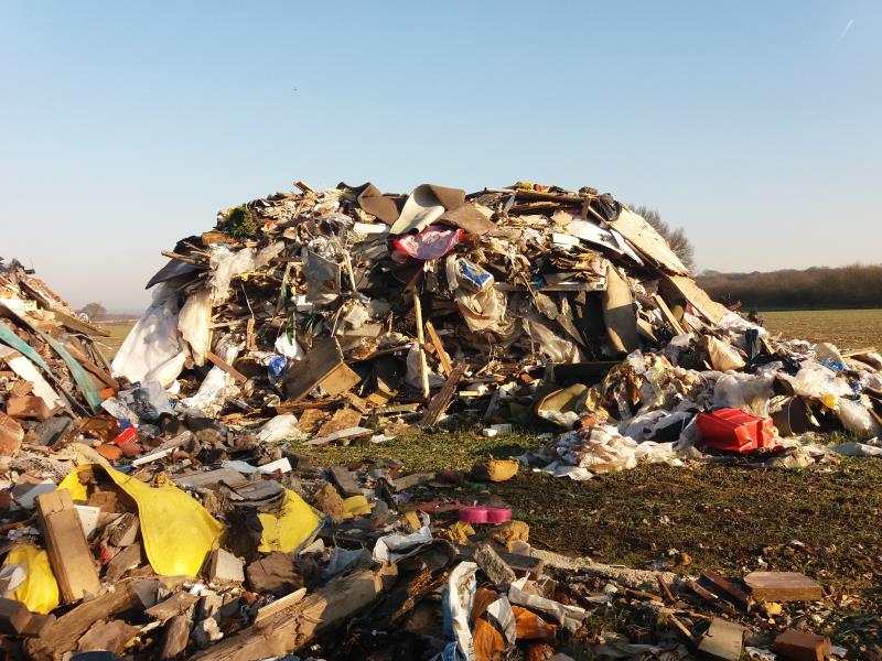 Flytipped rubbish on farm land