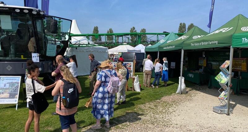 People standing around the NFU stand at the 2024 Nottinghamshire County Show 