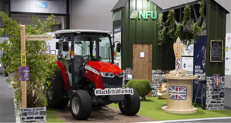 The NFU's stand featuring a red tractor and green shed