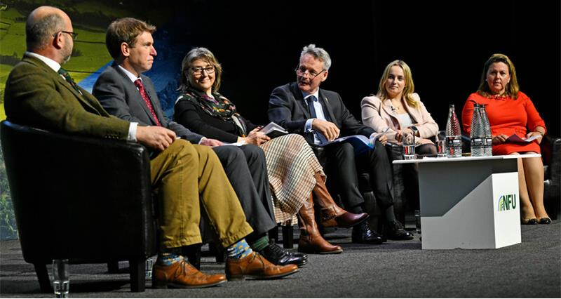 An image of the climate friendly farming panel on stage during NFU Conference 2023