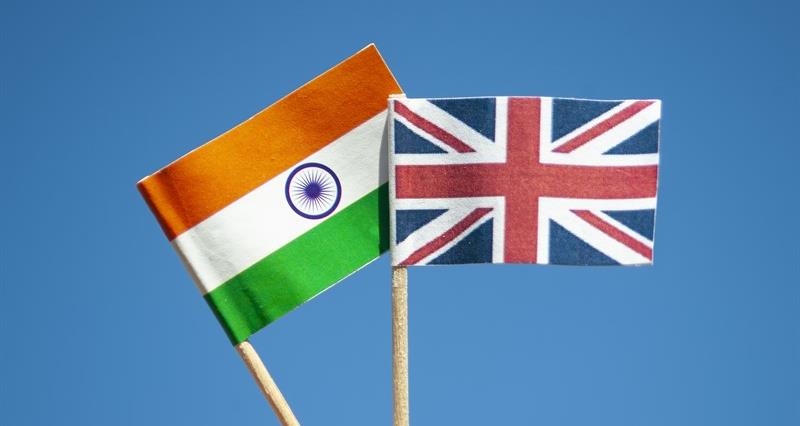An image of the flag of India alongside a Union Jack flag