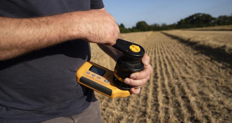 Testing the wheat for moisture content 