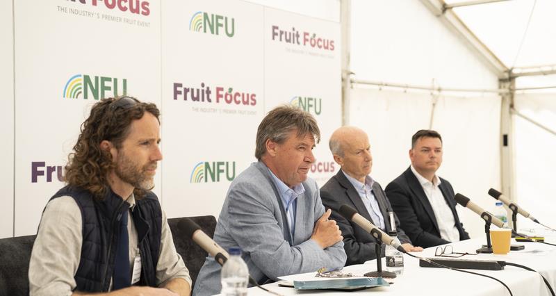 A photo from the Fruit Forum organised by NFU with chief adviser Lee Abbey, Martin Emmett, NFU Hort & Potatoes board chair, John Shropshire OBE, chair of the Independent Labour Review and Stephen Jacob, CEO of TIAH.