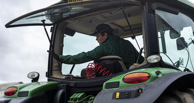 An image of a man sat inside a tractor