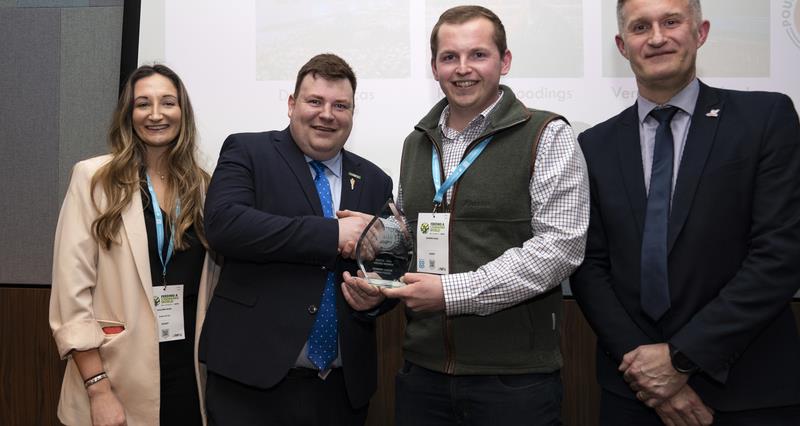 A picture of the 2022 Zoetis-NFU poultry trainee award winner, Dominic Lucas, pictured with NFU Poultry Board chair James Mottershead and two Zoetis judges.