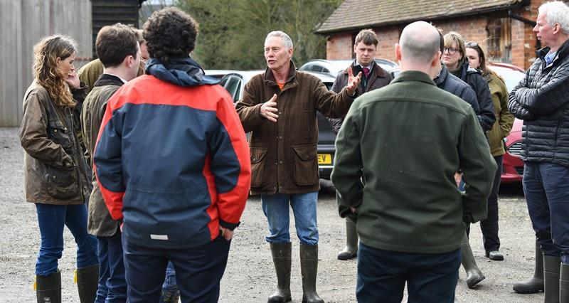 MPs speak to farmer
