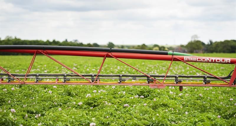 Crop sprayer in field