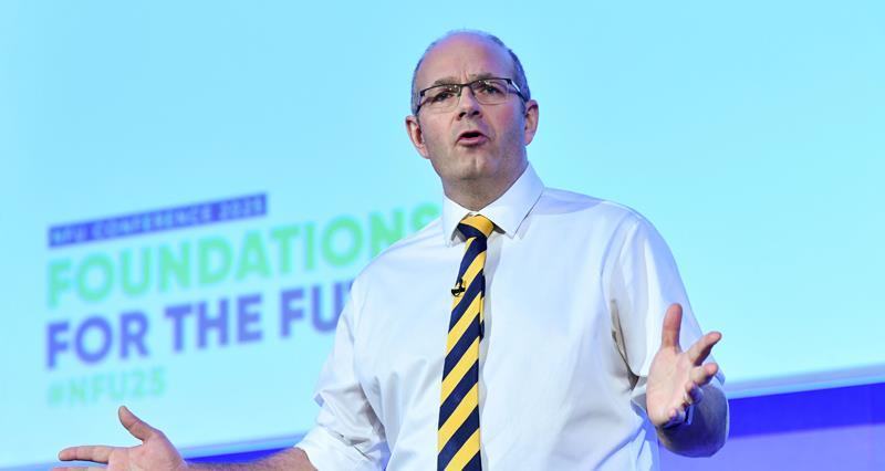 An image of NFU President Tom Bradshaw speaking on stage at NFU Conference.