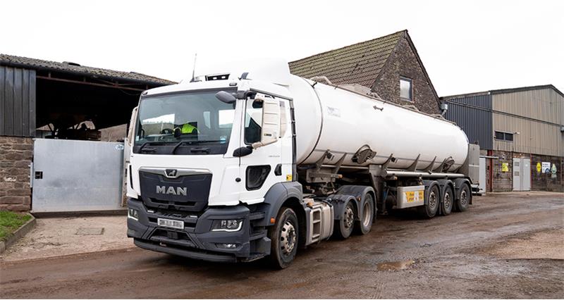 Milk delivery tanker on a dairy farm