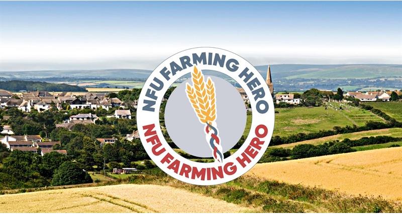 NFU Farming Hero badge sitting over a countryside village scene
