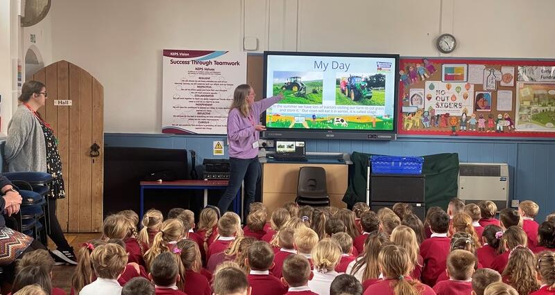 A Farmers for Schools ambassador delivering an assembly to a group of primary school children. 