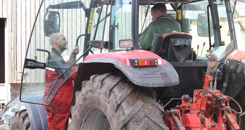 Farmer driving a tractor
