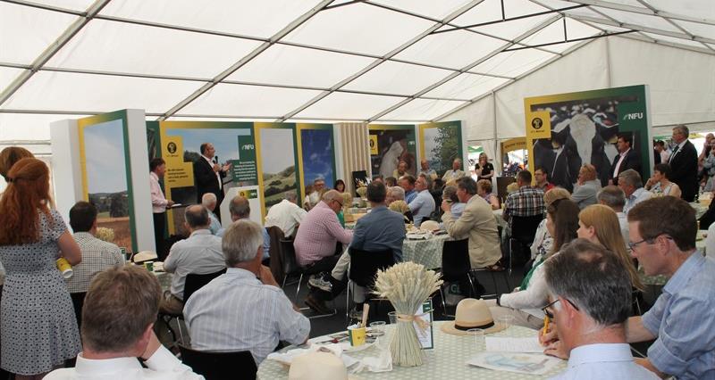 Tom Bradshaw speaks to a packed NFU marquee at the Royal Three Counties 