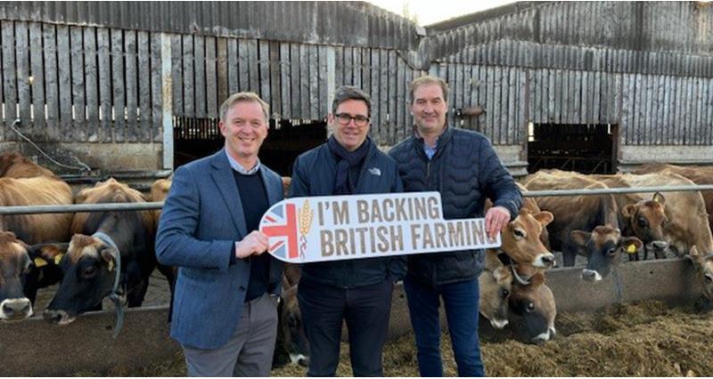 NFU member Johnny Hewitt, Greater Manchester Mayor Andy Burnham and host, NFU member Jason Entwistle stood on a farm