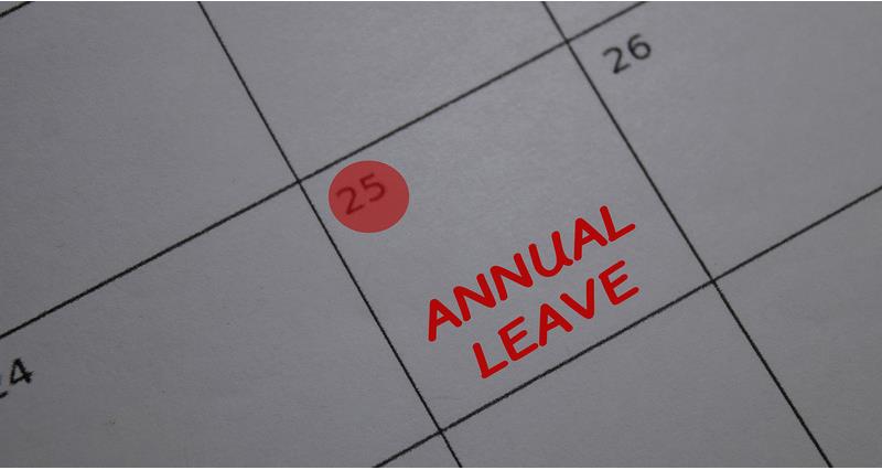A calendar marked with annual leave on date 25