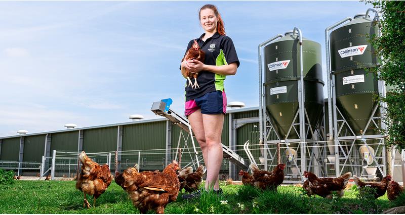 Ivory Arden with her chickens on her farm in Lincolnshire