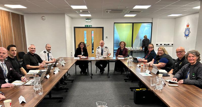 Representatives gather in a meeting room