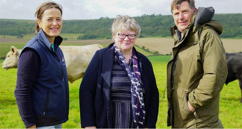 Therese Coffey, Scott Pepe and Peter Knight during a farm visit