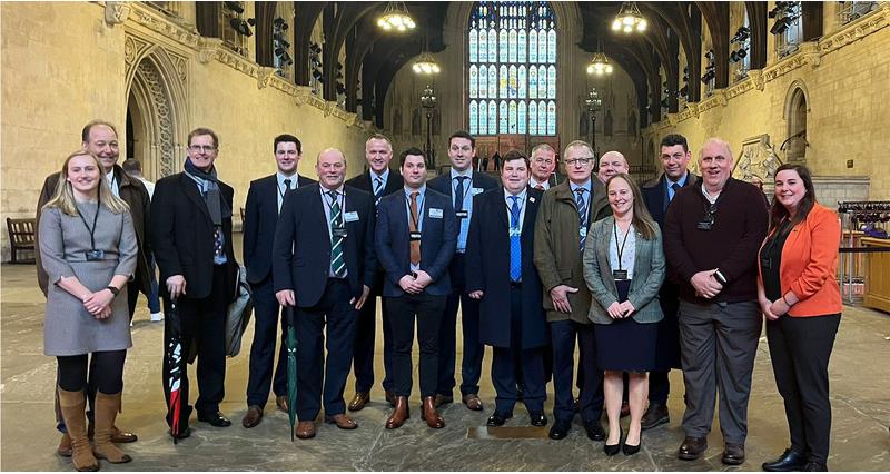 An image of the NFU Poultry Board members stood in Westminster Hall