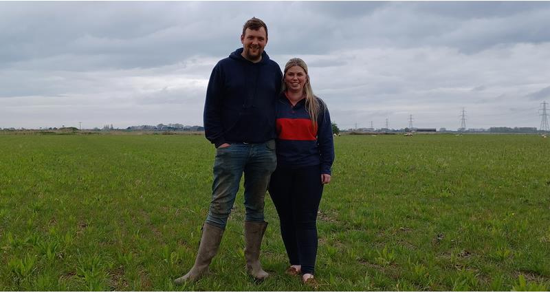 Hannah Hetherington and Tom Martin in a field