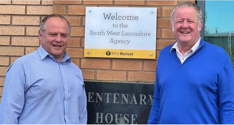A photo of South West Group Secretaries David Shove and Hedley Roberts outside their office