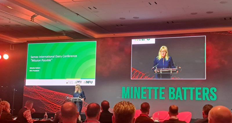 A photo of Minette Batters on stage at the Semex International Dairy Conference.
