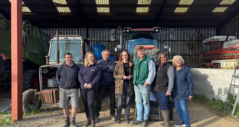 NFU members with MP Alison Bennett standuing in front of two tractors