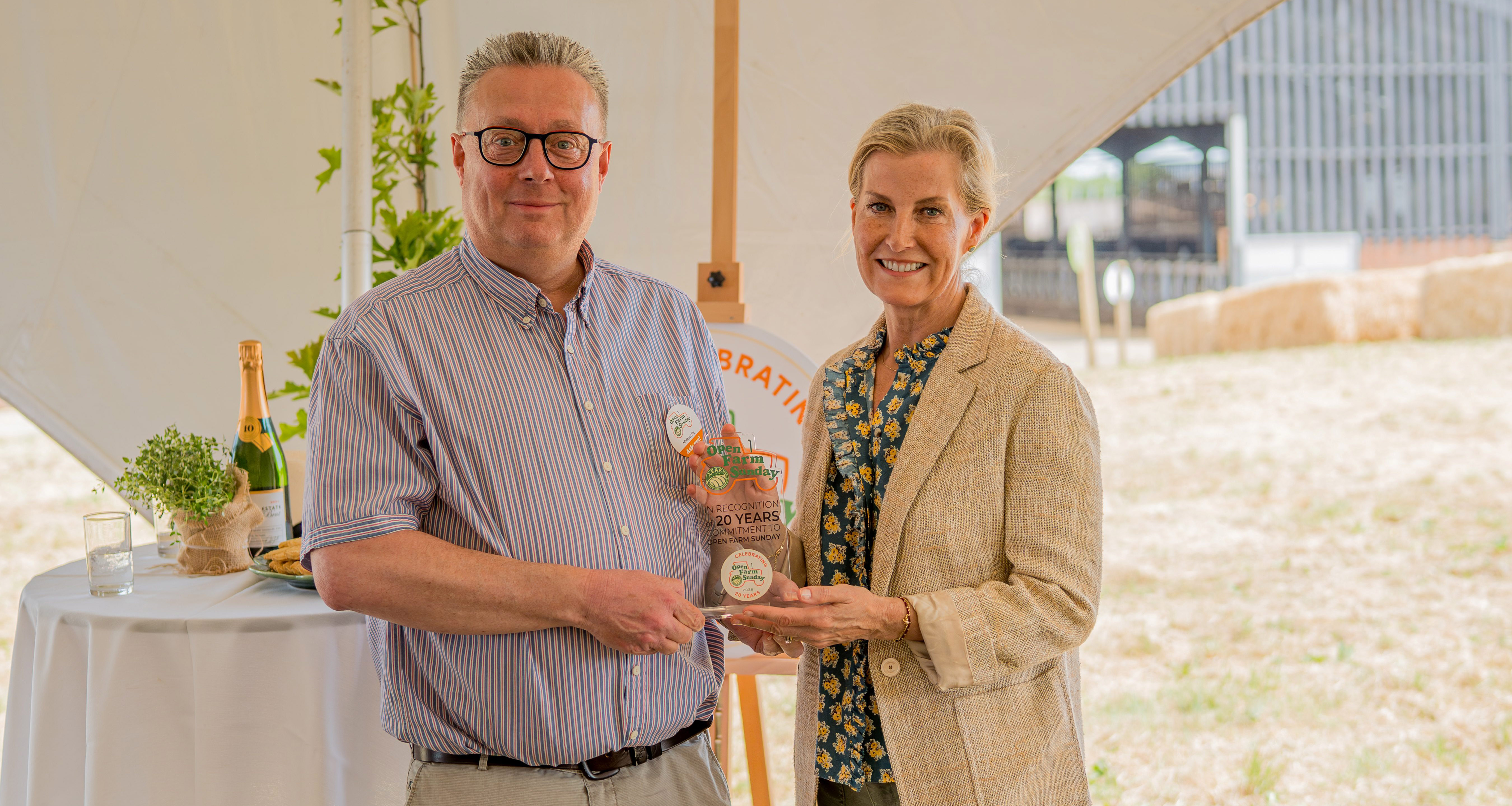 Michael Sly receives an award from HRH the Duchess of Edinburgh
