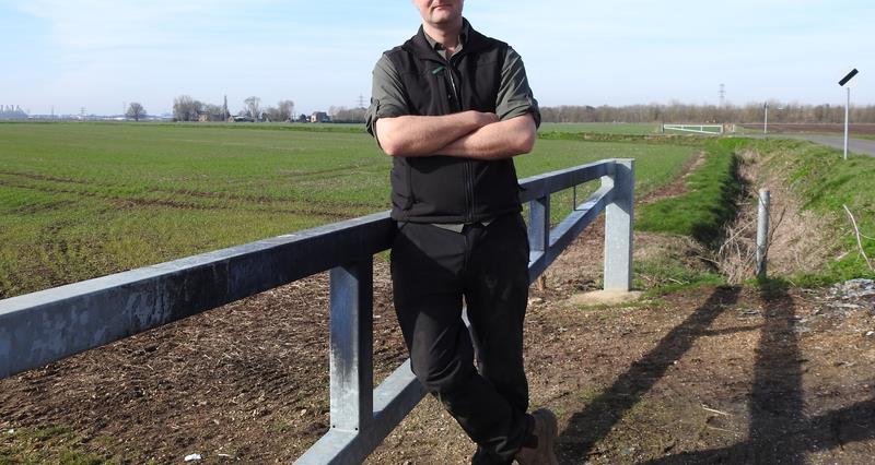 Farmer William Stevenson standing by a field that is regularly hit by fly tipping