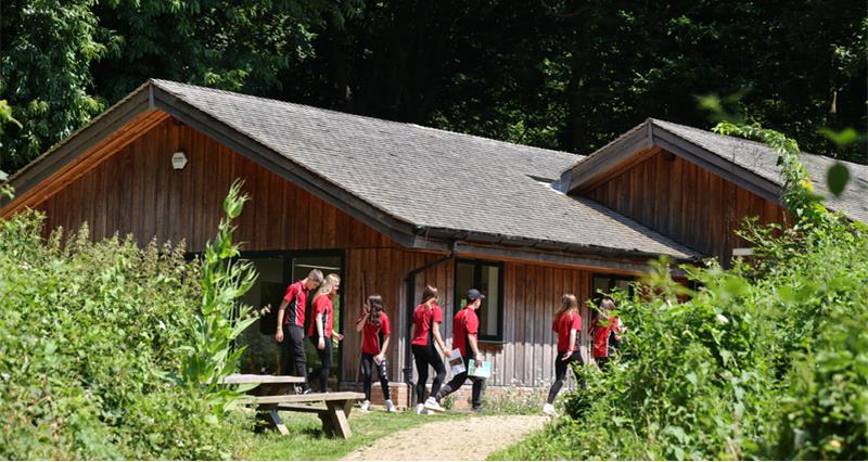 Children in front of the education centre at Goodwood Education Trust