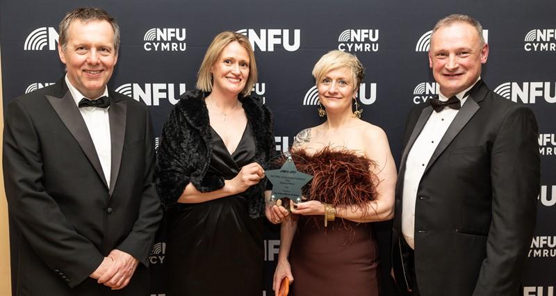 Adam Briggs and David Hall with North Achievement Award winners Miriam McGregor and Jane Potts 
