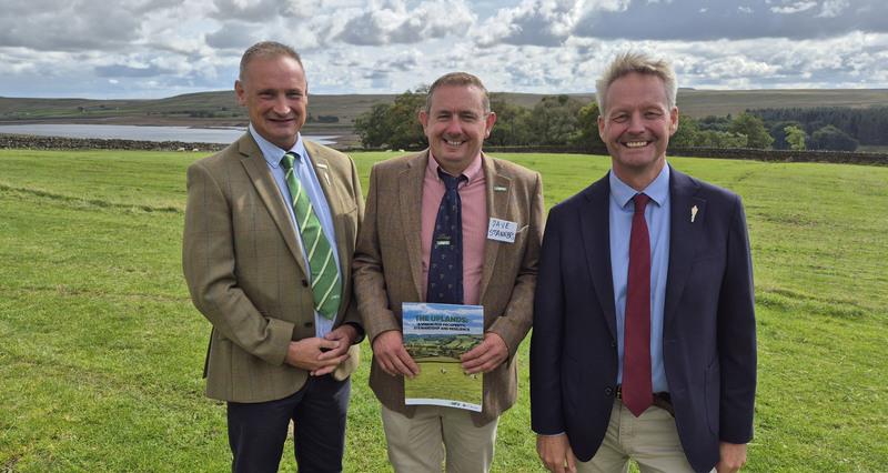 A photo of NFU North Regional Director David Hall, NFU North Uplands Group Chair Dave Stanners and NFU Deputy President David Exood on a field