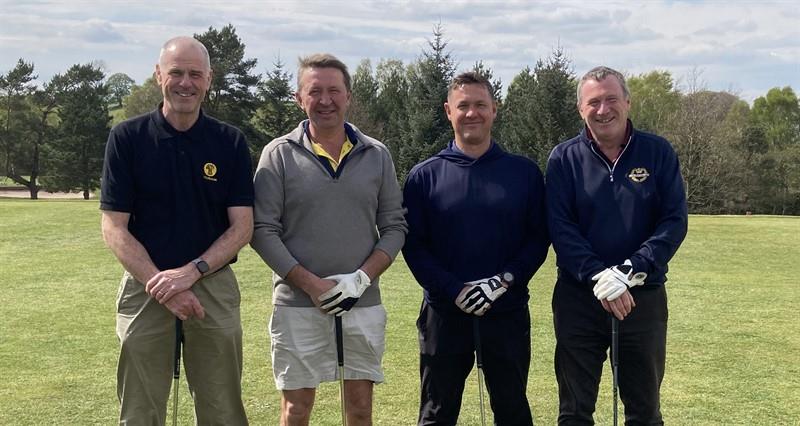 Michael Barnes on a Cumbria NFU golf day stood with fellow golfers on the green