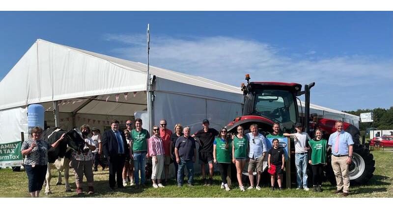 A photo of Cheshire NFU education marquee team members stood outside the NFU education marquee at Cheshire Show