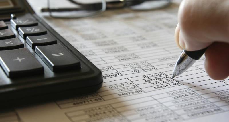 A picture of a calculator and some stats
