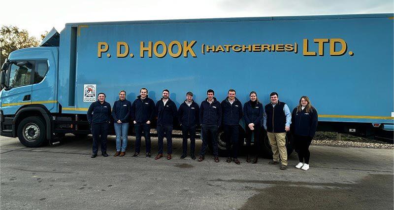 PIP 2024/25 participants stand in front of a P.D. Hook Hatchery lorry