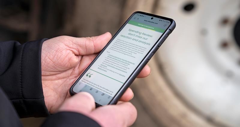 Person looking at bulletin on their phone