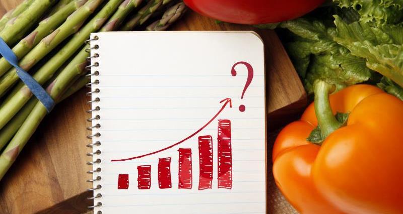 A picture showing fruit and veg and a graph depicting growth 