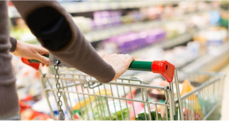 Person pushing a shopping trolley