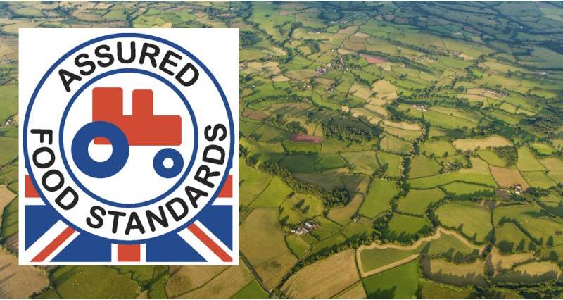 red tractor logo on aerial view of countryside, web crop_39669